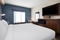 Courtyard by Marriott - Large desk with conveniently placed lighting