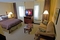 Hawthorn Suites by Wyndham Williamsville Buffalo Airport - The suite includes one queen bed and a pullout couch to comfortably fit maximum 3 adults OR 2 adults and 2 small children. 