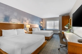 Cambria Hotel LAX - The standard room with two queen beds includes complimentary WiFi.