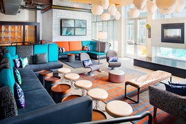 aLoft Philadelphia Airport - Gather with friends and family in the plush seating in the hotel lobby.