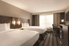 Country Inn & Suites by Radisson Indianapolis Airport South - Standard double Queen Room with microwave and mini fridge in every room.