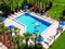 Holiday Inn Orlando International Airport - Unwind with friends and family in the hotel's heated outdoor pool.