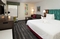 Hampton Inn Greensboro Airport - The standard room with a king size bed and a full size sleeper sofa