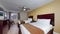 Rodeway Inn & Suites Fort Lauderdale Airport & Cruise Port - The standard room with two queen beds includes complimentary WiFi. 