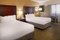 Crowne Plaza St. Louis Airport - Relax in this spacious room with two double beds. Each guest room includes a 37 inch flat screen TV. 