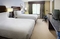 Hilton Garden Inn Raleigh Durham Airport - The standard room with 2 double beds includes complimentary WiFi. 