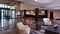 Embassy Suites - Enjoy the comfortable seating in the lobby while waiting for your transfers to the airport.