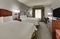 Hampton Inn & Suites Indianapolis Airport - The standard room with 2 queen beds includes complimentary WiFi. 
