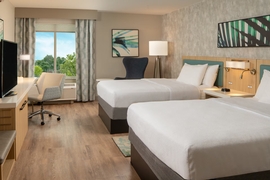 Hilton Garden Inn Orlando Airport - The standard room with 2 queen beds includes complimentary WiFi. 