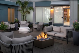 Hilton Garden Inn Orlando Airport - Enjoy the firepit on the hotel's outdoor patio. 