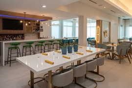 Hilton Garden Inn Orlando Airport - Grab a meal and drinks at the hotel's restaurant & lounge. 
