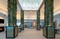 Hilton Garden Inn Orlando Airport - Relax in the lobby with travel companions. 