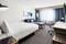 Courtyard Marriott Midway - 7 Days Parking - The standard king room includes complimentary WiFi, a refrigerator and microwave. 