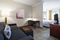 SpringHill Suites by Marriott Denver Airport - The standard room with a king size bed includes a full size sleeper sofa.