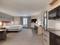 Candlewood Suites Milwaukee Airport-Oak Creek - The standard queen room includes a TV, microwave, refrigerator, and free WIFI.