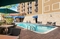 Hampton Inn & Suites FLL Airport South - Relax with friends and family at the hotel's outdoor pool. 