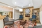 Country Inn & Suites Atlanta Airport South - Relax with friends and family in the hotel lobby.