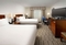 Holiday Inn Express Baltimore At The Stadiums - The standard room with two queen beds includes a 37 inch flat screen TV, a mini fridge, and a spacious workstation.