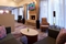 Courtyard by Marriott Metro Detroit Airport - Relax with friends and family in the cozy hotel lobby. 