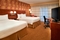 Courtyard by Marriott Metro Detroit Airport - The standard room with two queen beds includes complimentary WiFi. 