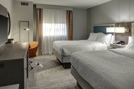Hampton Inn & Suites Miami Airport South Blue Lagoon - The standard room with 2 queen beds includes complimentary WiFi. 