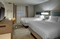 Hampton Inn & Suites Miami Airport South Blue Lagoon - The standard room with 2 queen beds includes complimentary WiFi. 