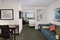SpringHill Suites Ft. Lauderdale Airport and Cruise Port - The standard room with a king size bed has a separate living room with a sleeper sofa, a microwave, and refrigerator.