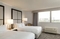 Hilton Chicago Oak Lawn - The standard room with two queen beds includes complimentary WiFi. 