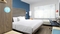 Tru by Hilton Denver Airport - 7 Days Parking Package - The standard, spacious king room includes free WIFI, mini refrigerator and flat screen TV.