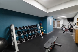 Hampton Inn & Suites Salt Lake City Airport - Keep up with your gym routine in the hotel's fitness center.