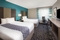 LaQuinta Inn & Suites Atlanta Airport North - The standard room with 2 queen beds includes complimentary WiFi, mini refrigerator, and microwave.