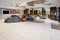 LaQuinta Inn & Suites Atlanta Airport North - Relax with travel companions in the hotel's lobby.