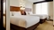 Hyatt Place Raleigh-Durham Airport - The standard room with 2 double beds includes complimentary WiFi, mini refrigerator, and a pullout sofa bed. 