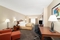Wingate By Wyndham Charlotte Airport - The standard king room includes complimentary WiFi. 