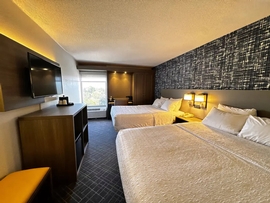 Pittsburgh Inn & Suites - The standard room with two queen size beds includes free WiFi, a desk, and coffee maker.