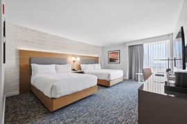 DoubleTree Hotel JFK Airport - The standard room with 2 queen beds includes complimentary WiFi.