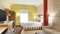 Home2 Suites Charlotte Airport - The standard, spacious queen room includes a sleeper sofa and fully equipped kitchen 