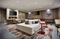 DoubleTree by Hilton Chicago Midway Airport - Relax with your travel companions in the hotel's modern lobby.