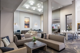 Hilton Cocoa Beach Oceanfront Port Canaveral - Relax with friends and family in the hotel lobby.